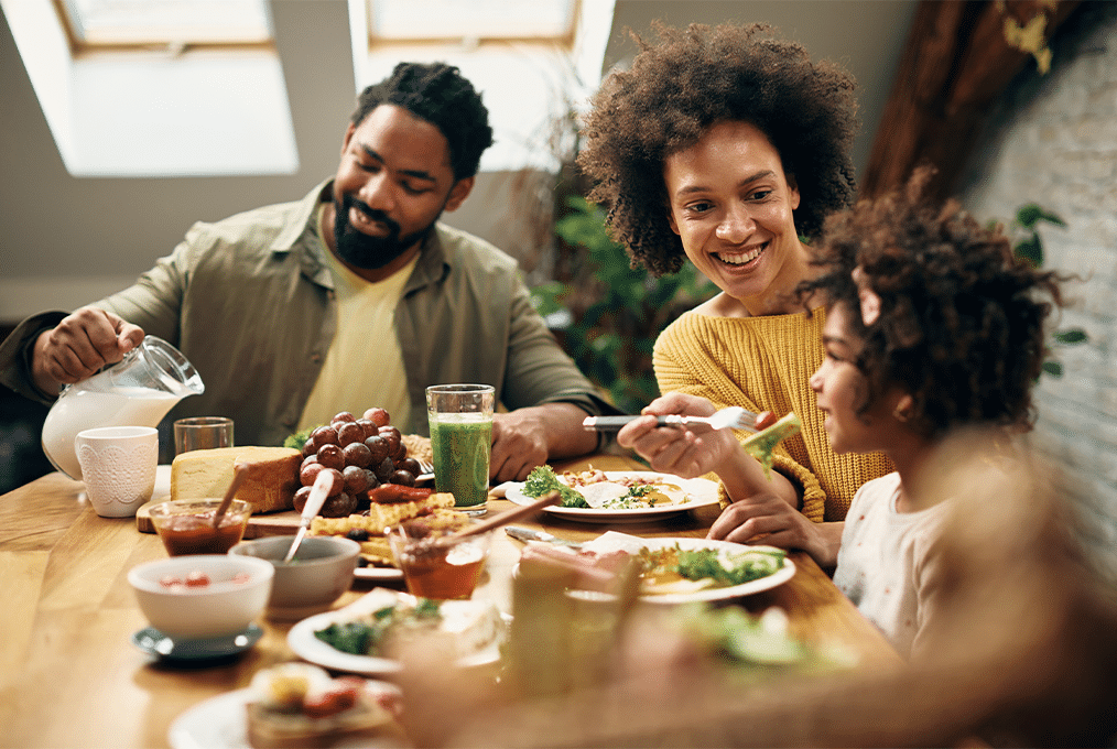 ACCFB-2 Smiling family eating a healthy meal together
