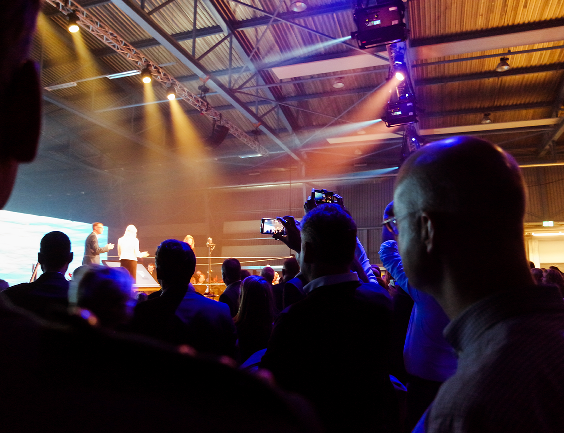 webdev-freeman5 WebDevStudios - Freeman case study: Event audience looks onstage.